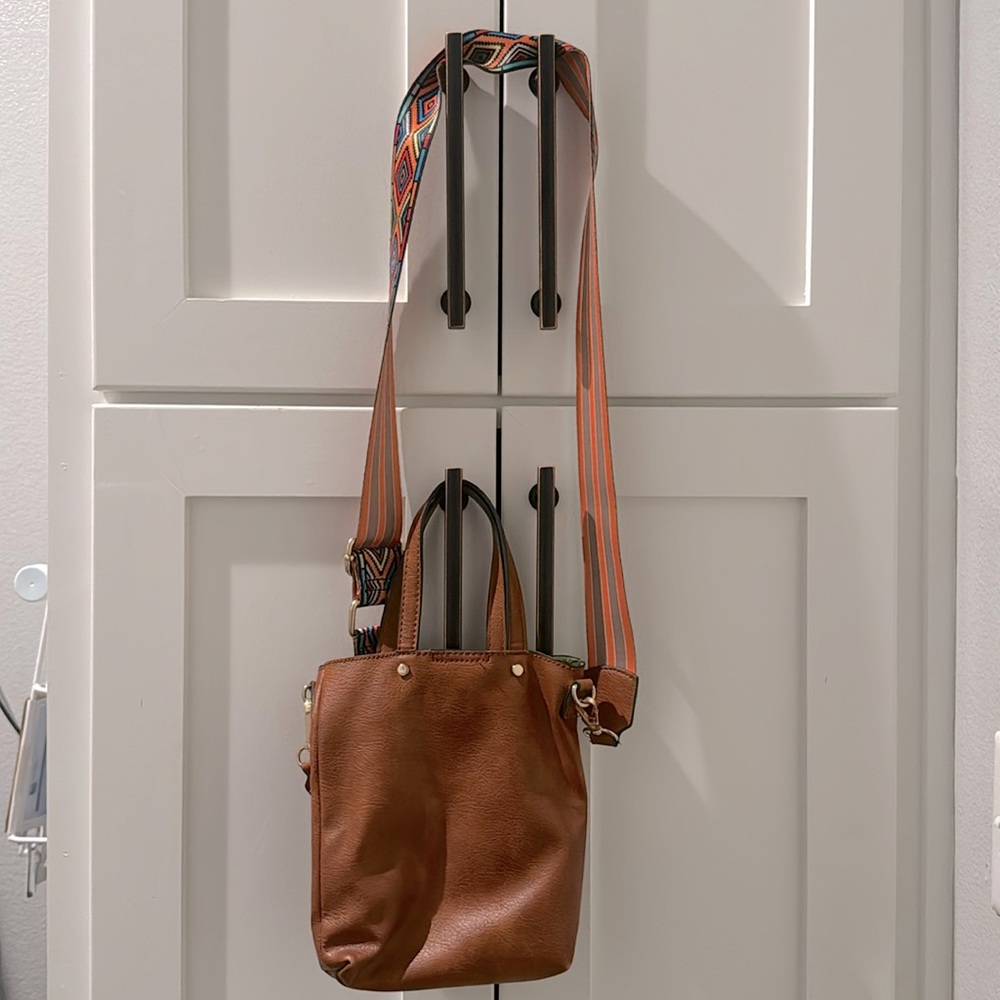 Small brown crossbody bag with double sided strap